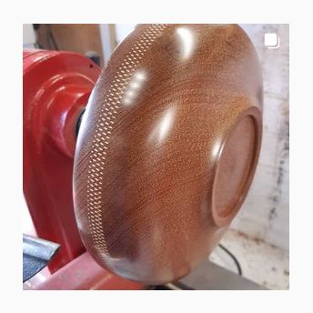 Walnut and gilt bowl